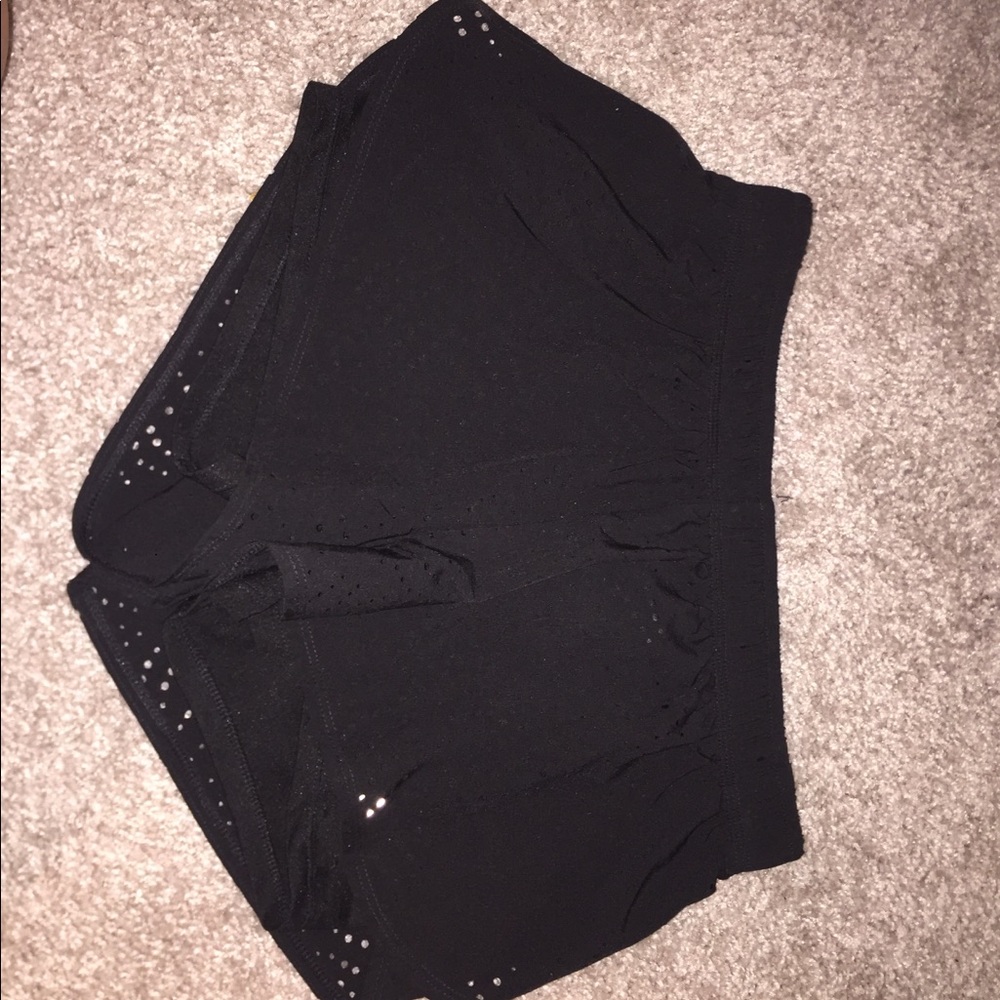 black look alike lulu shorts with holes